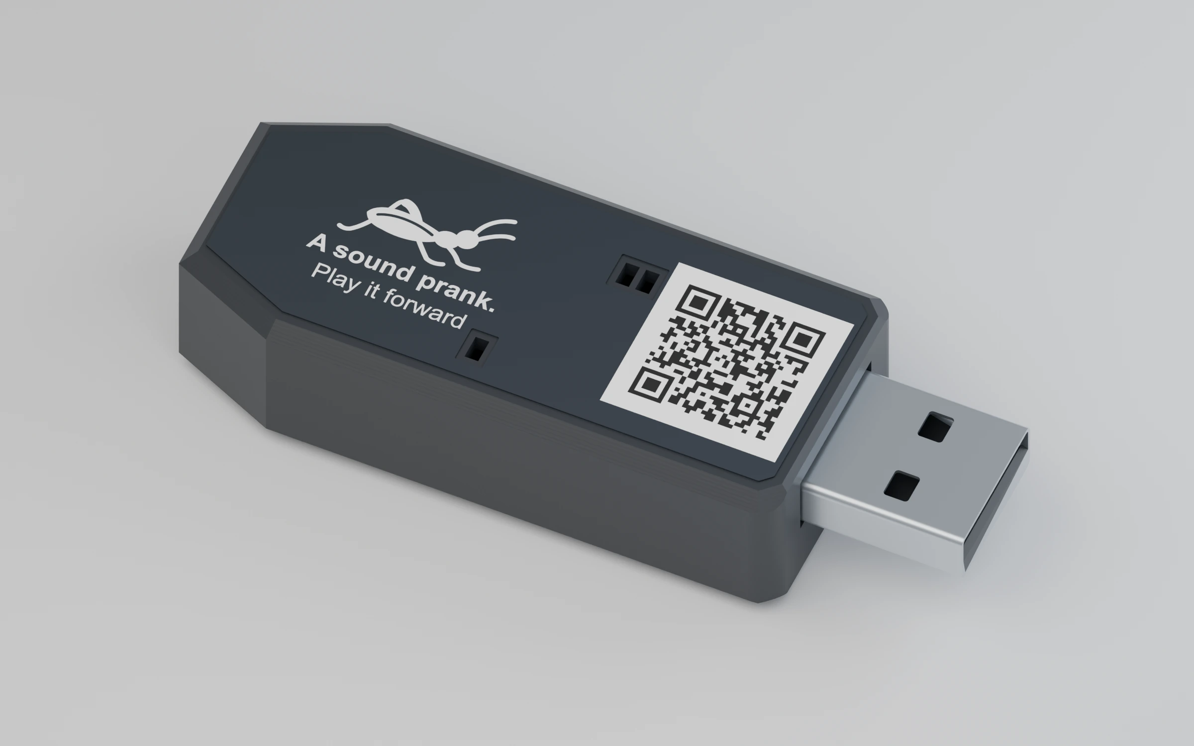 Cricket 008 USB-A sound prank device with a charcoal enclosure, cricket label, LED windows and instructions QR.